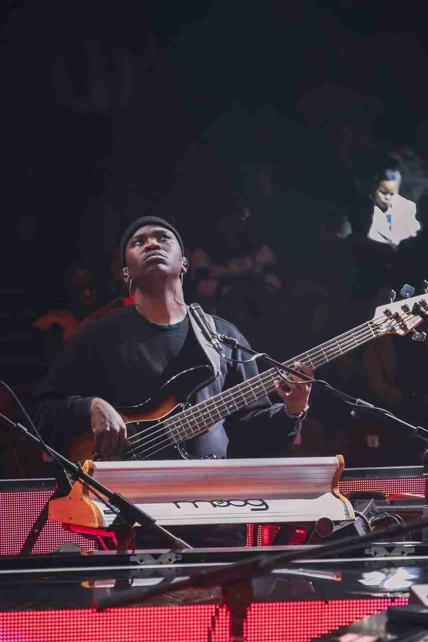 Thokozani MJ mid-performance with bass and Moog